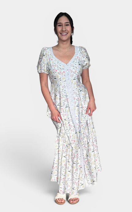 Elegant floral maxi dress with button-front design and puff sleeves
