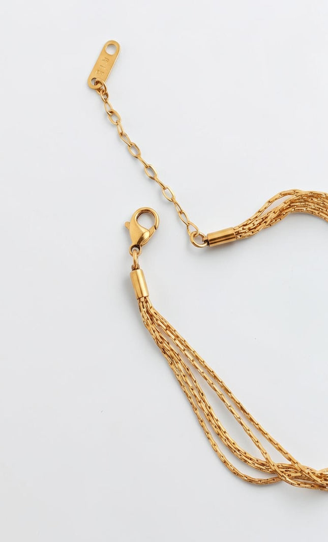 Close‑up of lobster clasp and extension chain for adjustable fit.