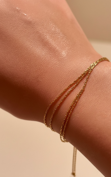 Bracelet worn alone on wrist for a minimal everyday look.