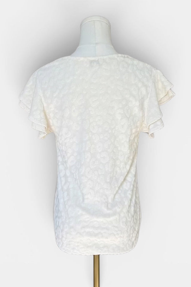 An off-white textured short-sleeve top displayed on a mannequin torso against a plain white background.