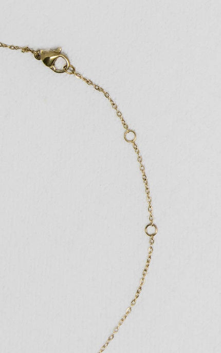 Mama Pendant Necklace — gold-plated necklace with multicolored zircon crystals, ethically made by survivors from Justyna Grace Boutique.