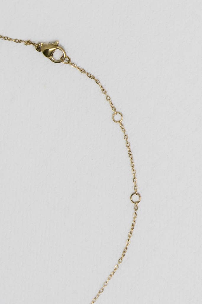 Mama Pendant Necklace — gold-plated necklace with multicolored zircon crystals, ethically made by survivors from Justyna Grace Boutique.