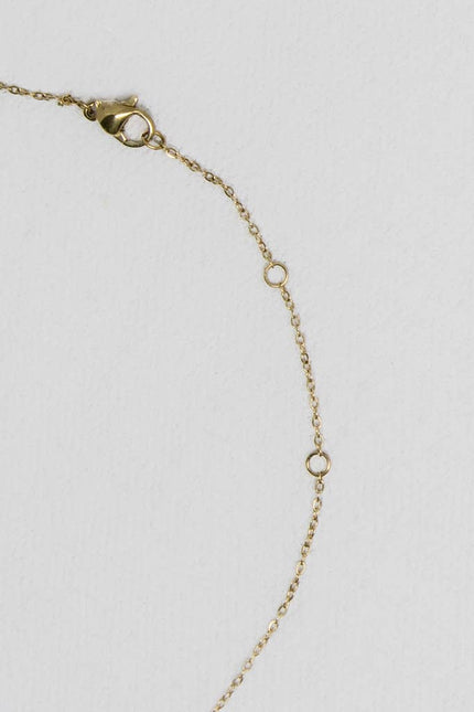 Mama Pendant Necklace — gold-plated necklace with multicolored zircon crystals, ethically made by survivors from Justyna Grace Boutique.