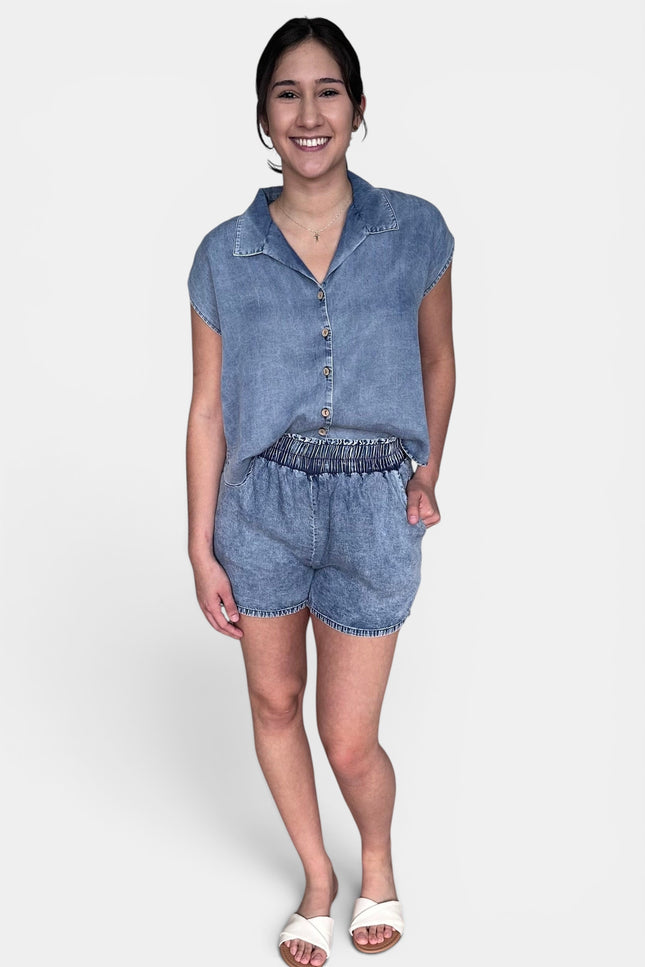 Blue sleeveless blouse full-length front