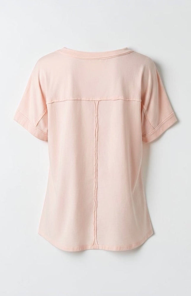 A back view of ghost mannequin product shot of the Pray Patchwork Cotton Tee in white, showcasing its relaxed, boxy silhouette, clean round neck, and how the lightweight 100% cotton knit drapes naturally.