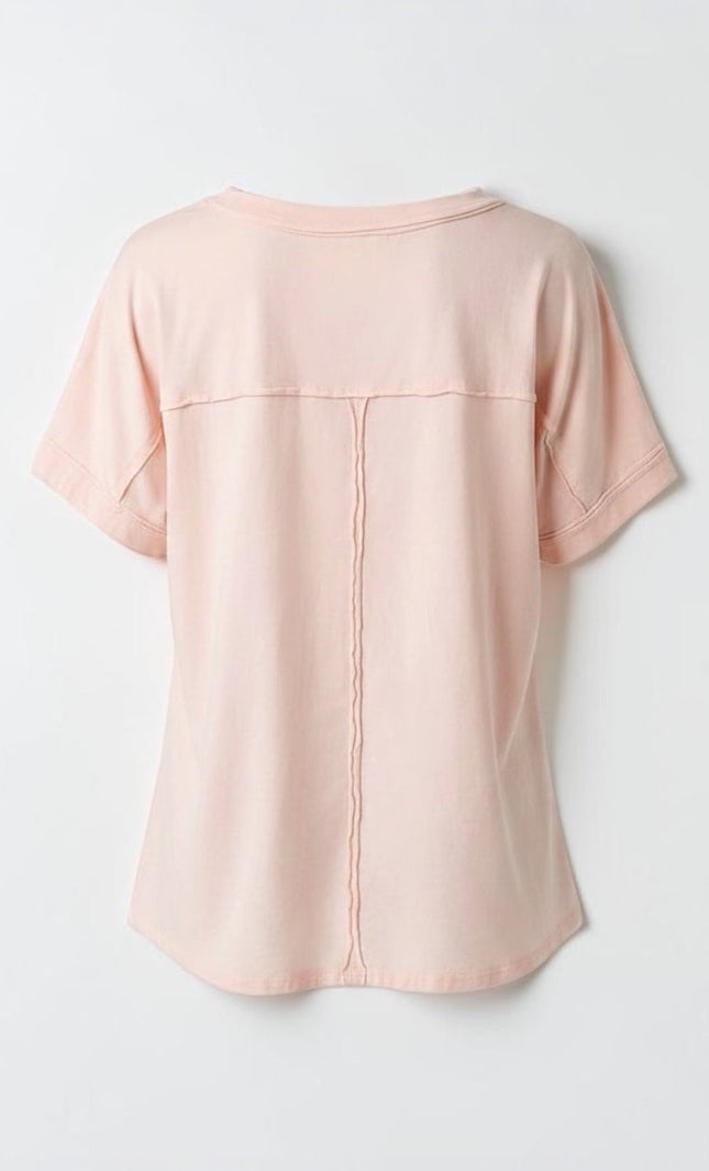 A back view of ghost mannequin product shot of the Pray Patchwork Cotton Tee in white, showcasing its relaxed, boxy silhouette, clean round neck, and how the lightweight 100% cotton knit drapes naturally.