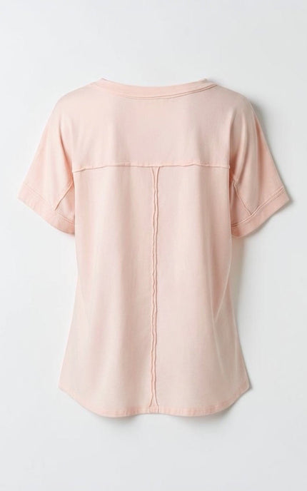 A back view of ghost mannequin product shot of the Pray Patchwork Cotton Tee in white, showcasing its relaxed, boxy silhouette, clean round neck, and how the lightweight 100% cotton knit drapes naturally.