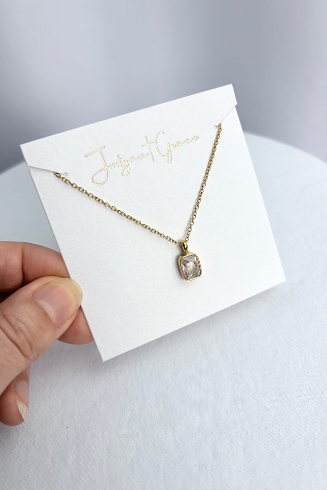 Necklace presented on a display card for a clean, gift‑ready look.