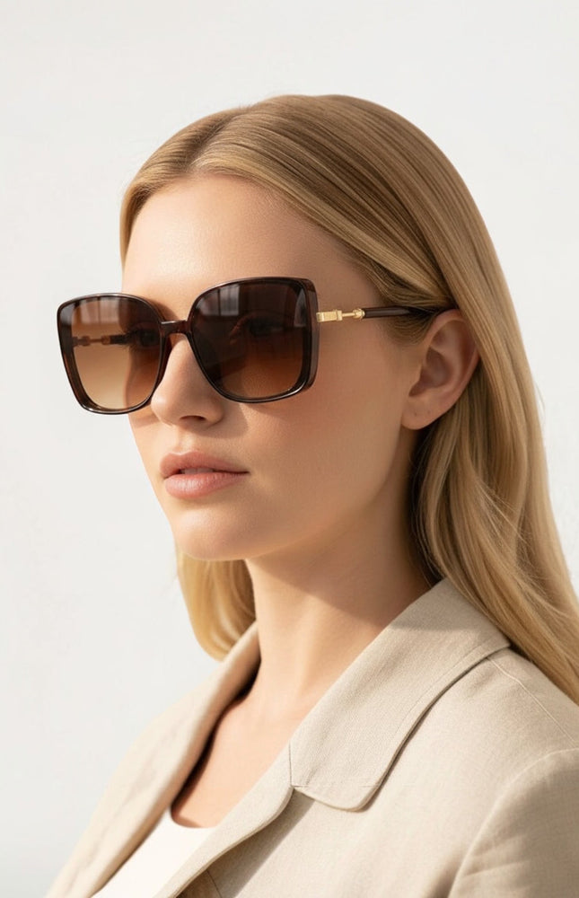 Oversized retro square‑round sunglasses with polycarbonate frames and 100% UV protection.