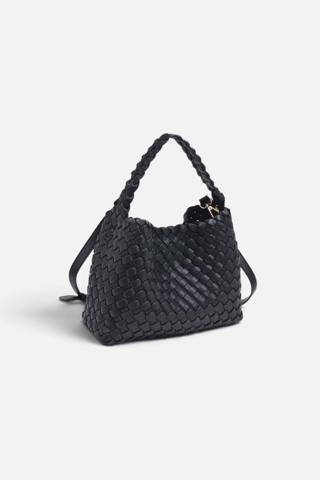 A black woven leather shoulder bag with braided handles and a small gold-tone logo charm, photographed on a clean light gray background.