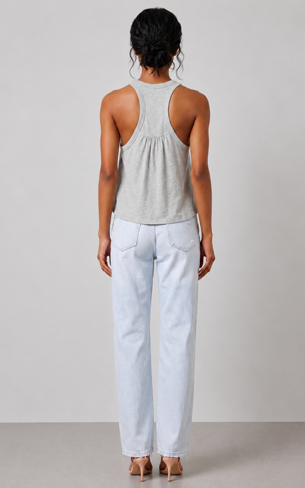 Gray sage tank top and light blue jeans against a plain background
