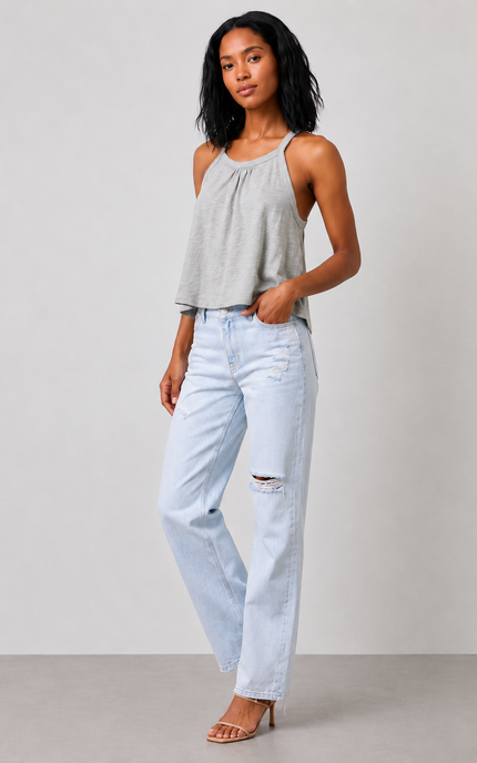 Gray sage sleeveless top and light blue jeans on a plain background