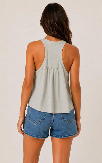 Back view of a sage green racerback swing tank showcasing the racerback design and relaxed cotton fit.