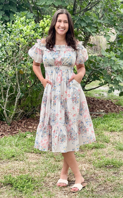 Functional side pocket detail on floral print tiered midi dress