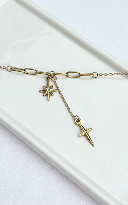 18k gold PVD plating with cubic zirconia accents, waterproof and tarnish‑resistant.