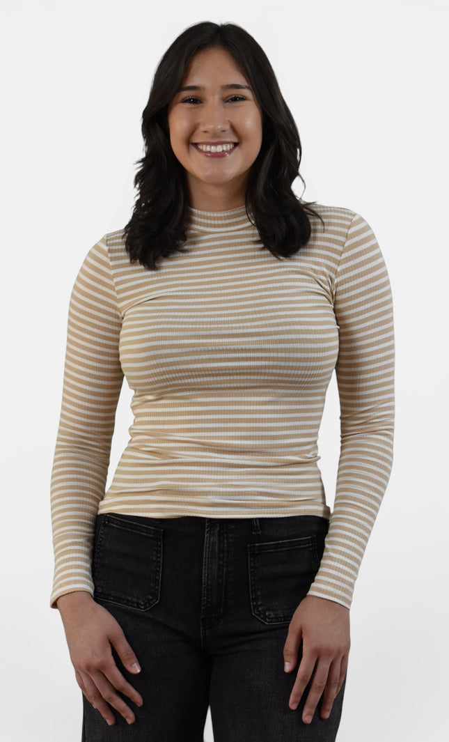Front view of women's taupe and cream striped ribbed mock neck top.