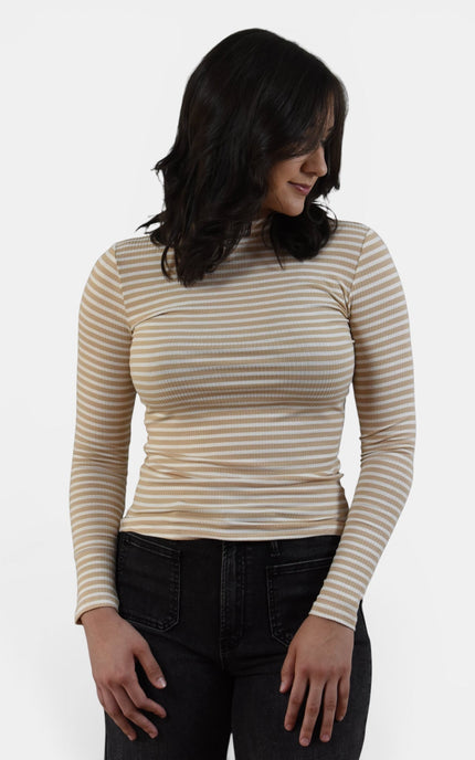 Women's striped mock neck long sleeve top with slim fit and ribbed knit.