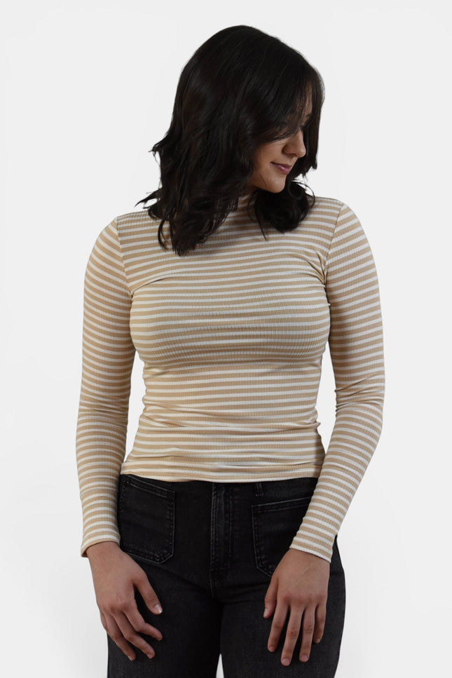 Women's striped mock neck long sleeve top with slim fit and ribbed knit.
