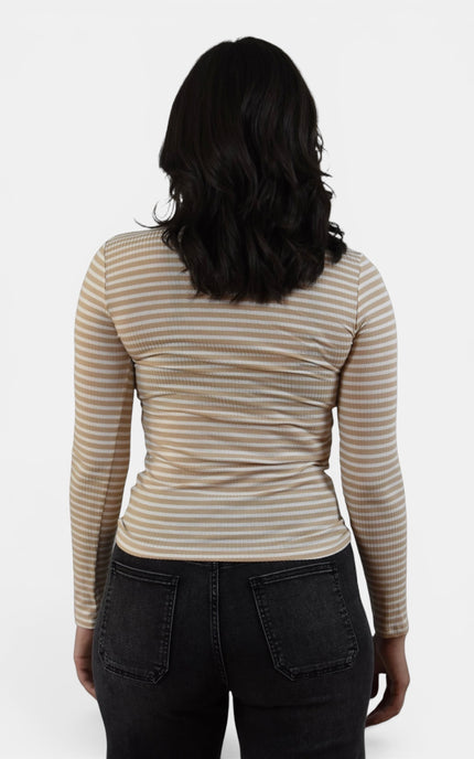 Back view of women's striped ribbed mock neck top.