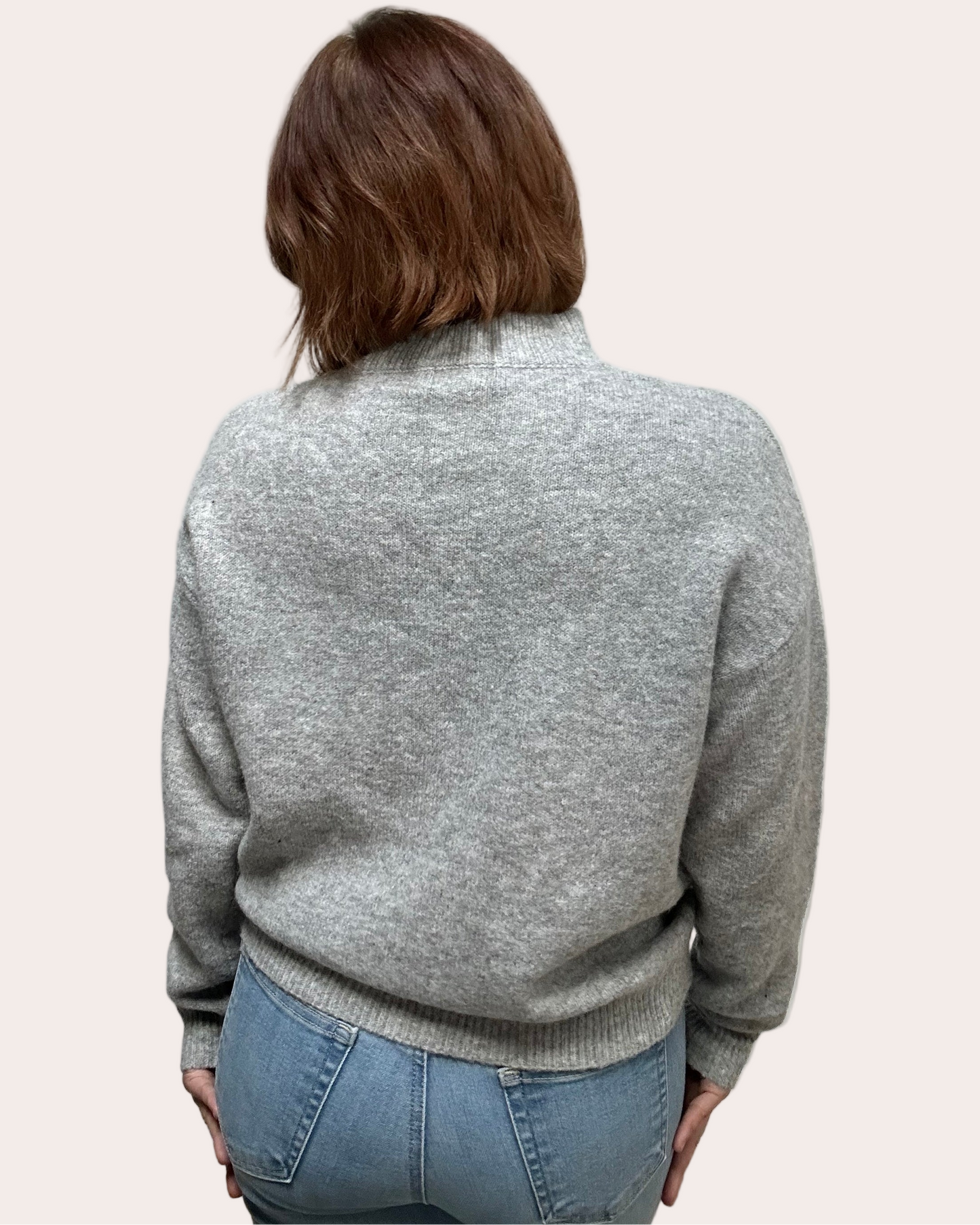 Heather grey crew-neck sweater with soft contrast stitching along the neckline and sleeves, midweight knit with stretch, photographed on a Soft Linen background for Justyna Grace Boutique.
