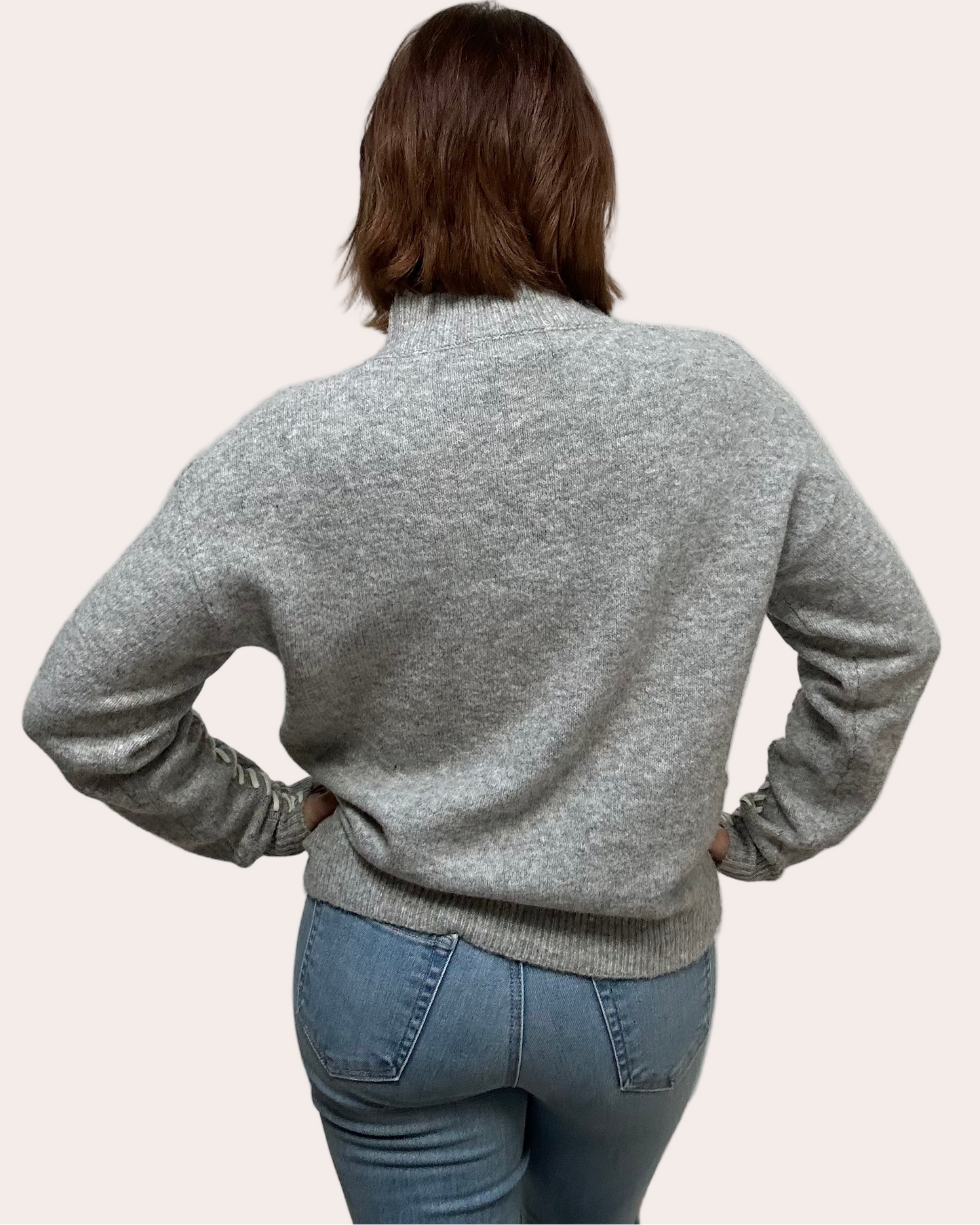 Heather grey crew-neck sweater with soft contrast stitching along the neckline and sleeves, midweight knit with stretch, photographed on a Soft Linen background for Justyna Grace Boutique.