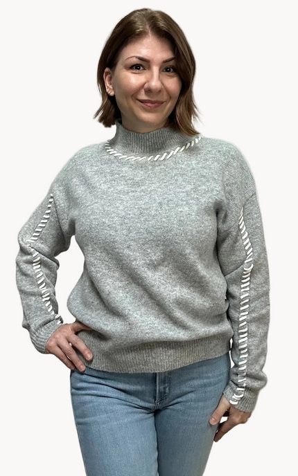 Heather grey crew-neck sweater with soft contrast stitching along the neckline and sleeves, midweight knit with stretch, photographed on a Soft Linen background for Justyna Grace Boutique.