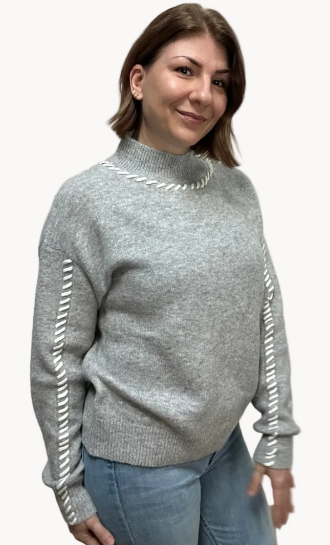 Heather grey crew-neck sweater with soft contrast stitching along the neckline and sleeves, midweight knit with stretch, photographed on a Soft Linen background for Justyna Grace Boutique.