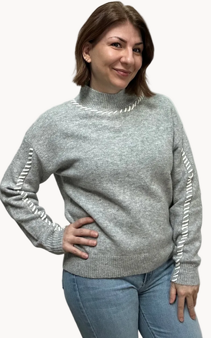 Heather grey crew-neck sweater with soft contrast stitching along the neckline and sleeves, midweight knit with stretch, photographed on a Soft Linen background for Justyna Grace Boutique.
