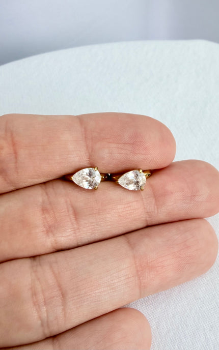 Delicate crystal drop hoop earrings with a polished gold finish.