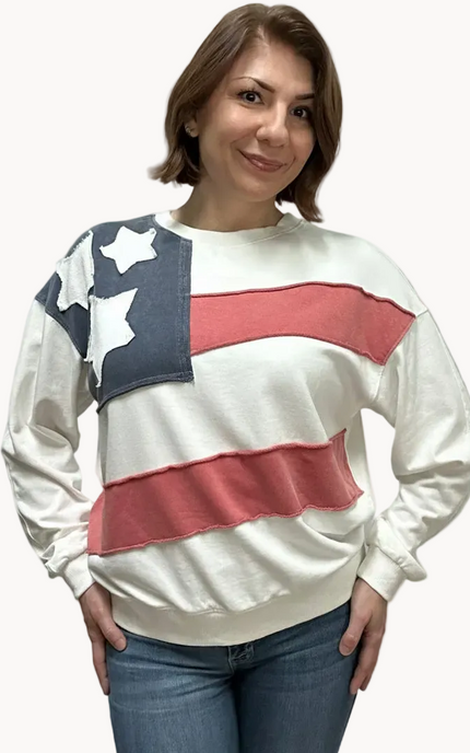 Close-up of a mineral-washed USA vintage pullover featuring an American flag patch on the front, relaxed oversized fit, and soft French terry knit — photographed for Justyna Grace Boutique.