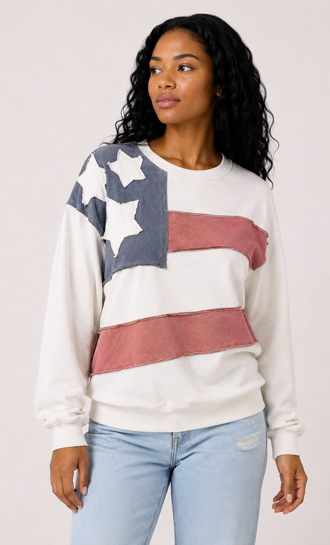 Front view of women's mineral wash USA pullover with American flag patch.