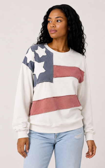 Front view of women's mineral wash USA pullover with American flag patch.