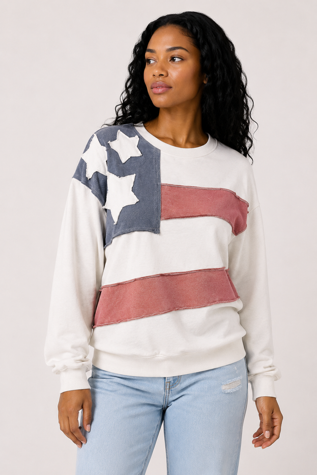 Front view of women's mineral wash USA pullover with American flag patch.