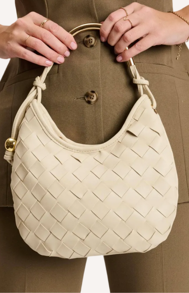 Vivienne woven hobo bag with sculpted crescent silhouette, featuring a woven front panel, gold hardware, and curved metal top handle.