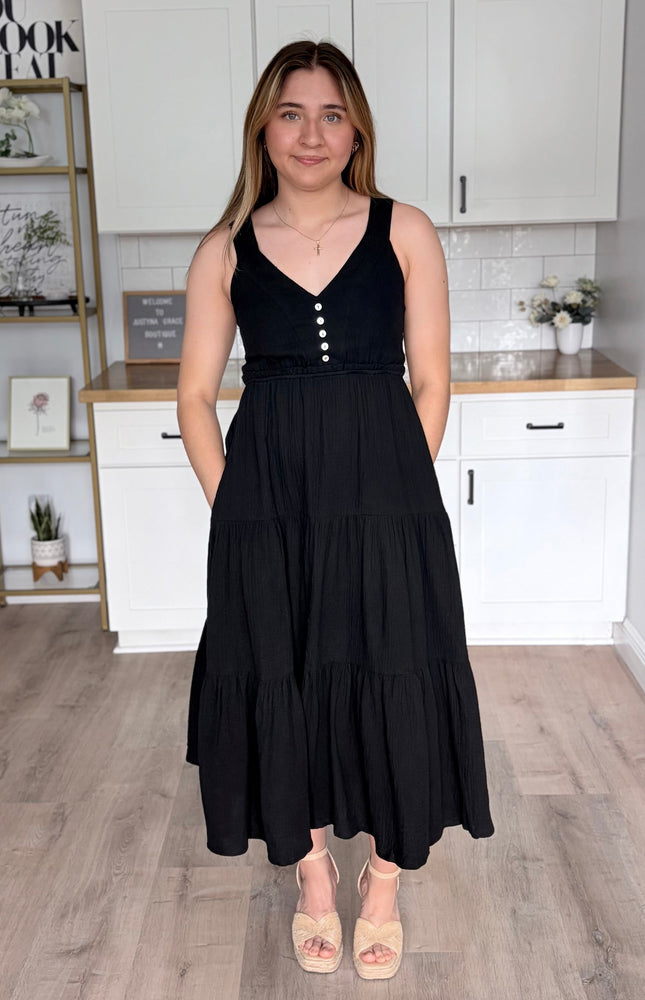 Black cotton gauze midi dress with sleeveless cut and fitted waist