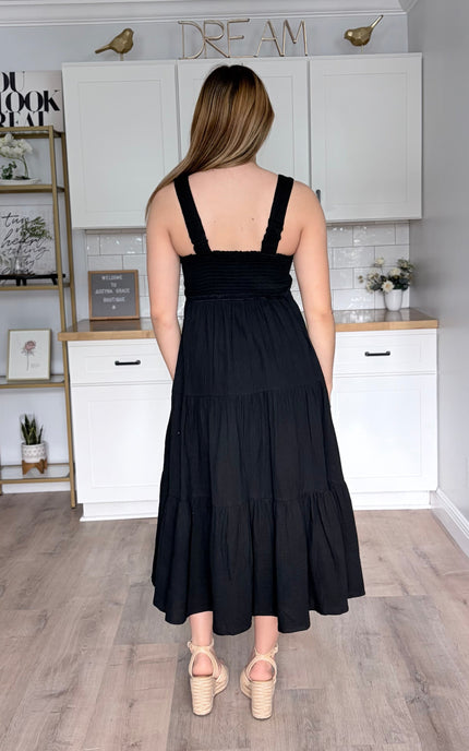 Lightweight 100 percent cotton midi dress in black with tiered skirt