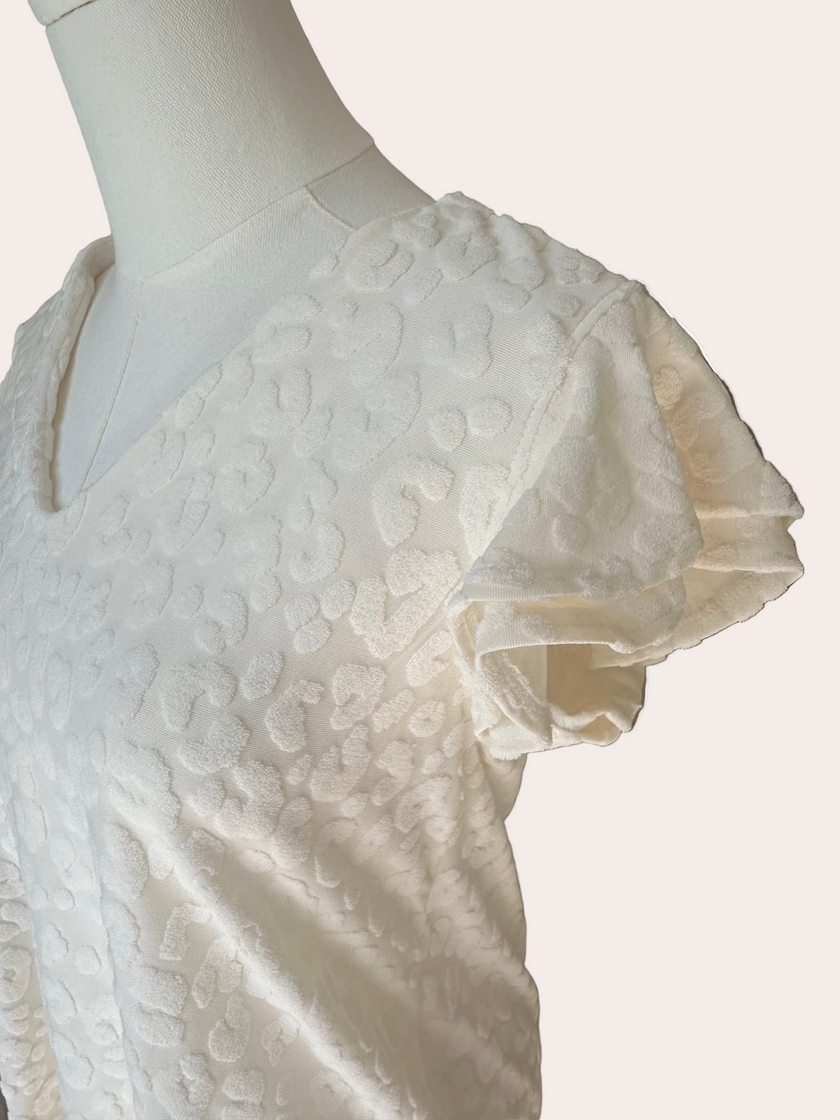 Animal Texture Top — lightweight V-neck blouse with ruffle sleeves and relaxed fit from Justyna Grace Boutique.