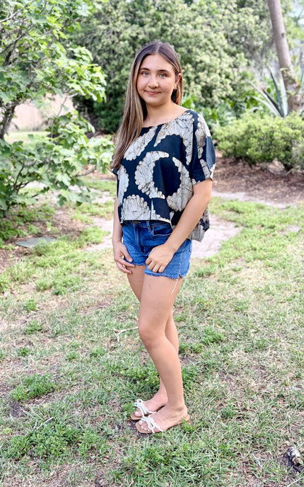 Side view of relaxed fit artisan top