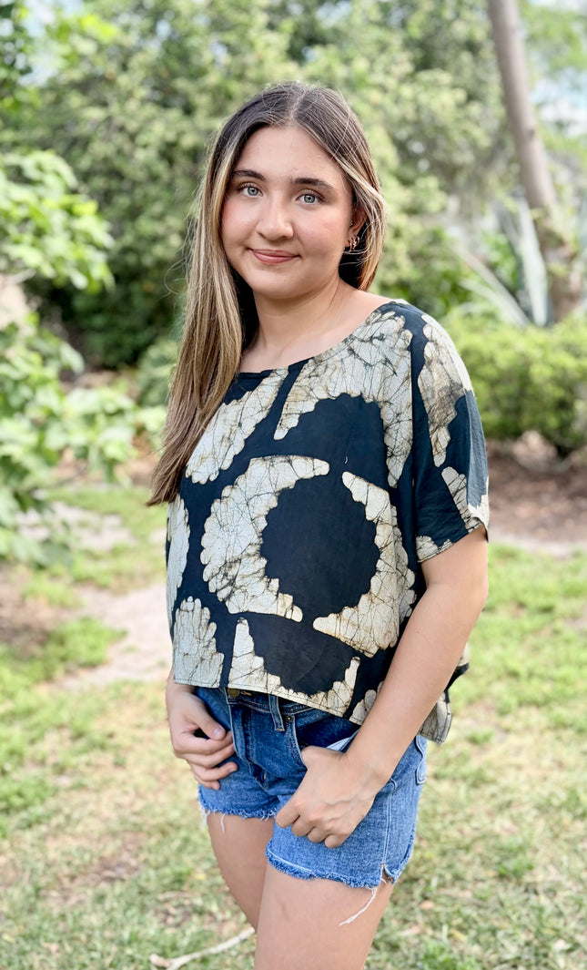 Side view of relaxed fit artisan top