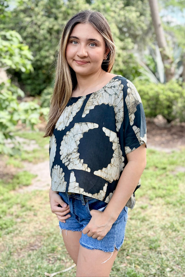 Side view of relaxed fit artisan top