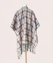 The Autumn Glen Reversible Plaid Ruana in ivory, red, and charcoal — cozy midweight knit wrap with tassel fringe from Justyna Grace Boutique.