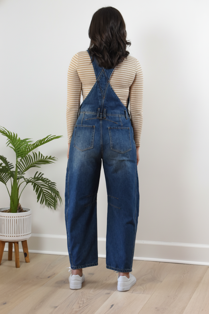 Barrel-Leg Denim Overalls — relaxed wide-leg overalls with classic bib front and adjustable straps from Justyna Grace Boutique.