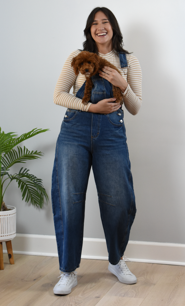 Barrel-Leg Denim Overalls — relaxed wide-leg overalls with classic bib front and adjustable straps from Justyna Grace Boutique.