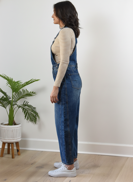 Barrel-Leg Denim Overalls — relaxed wide-leg overalls with classic bib front and adjustable straps from Justyna Grace Boutique.