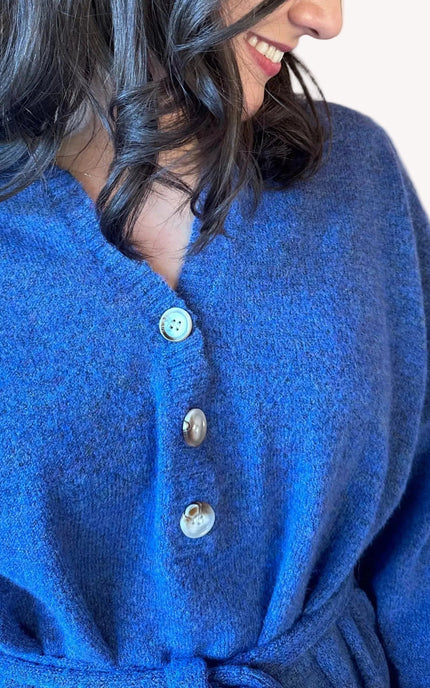 Collared V-neckline on relaxed knit tunic