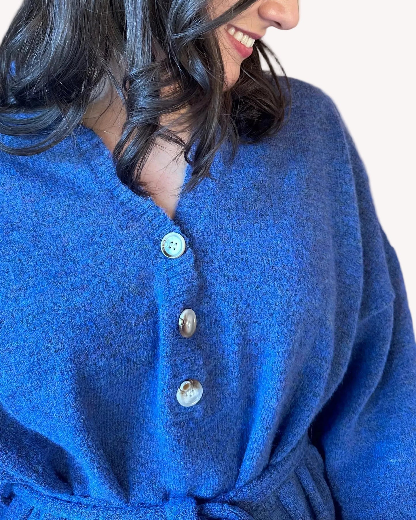 Collared V-neckline on relaxed knit tunic