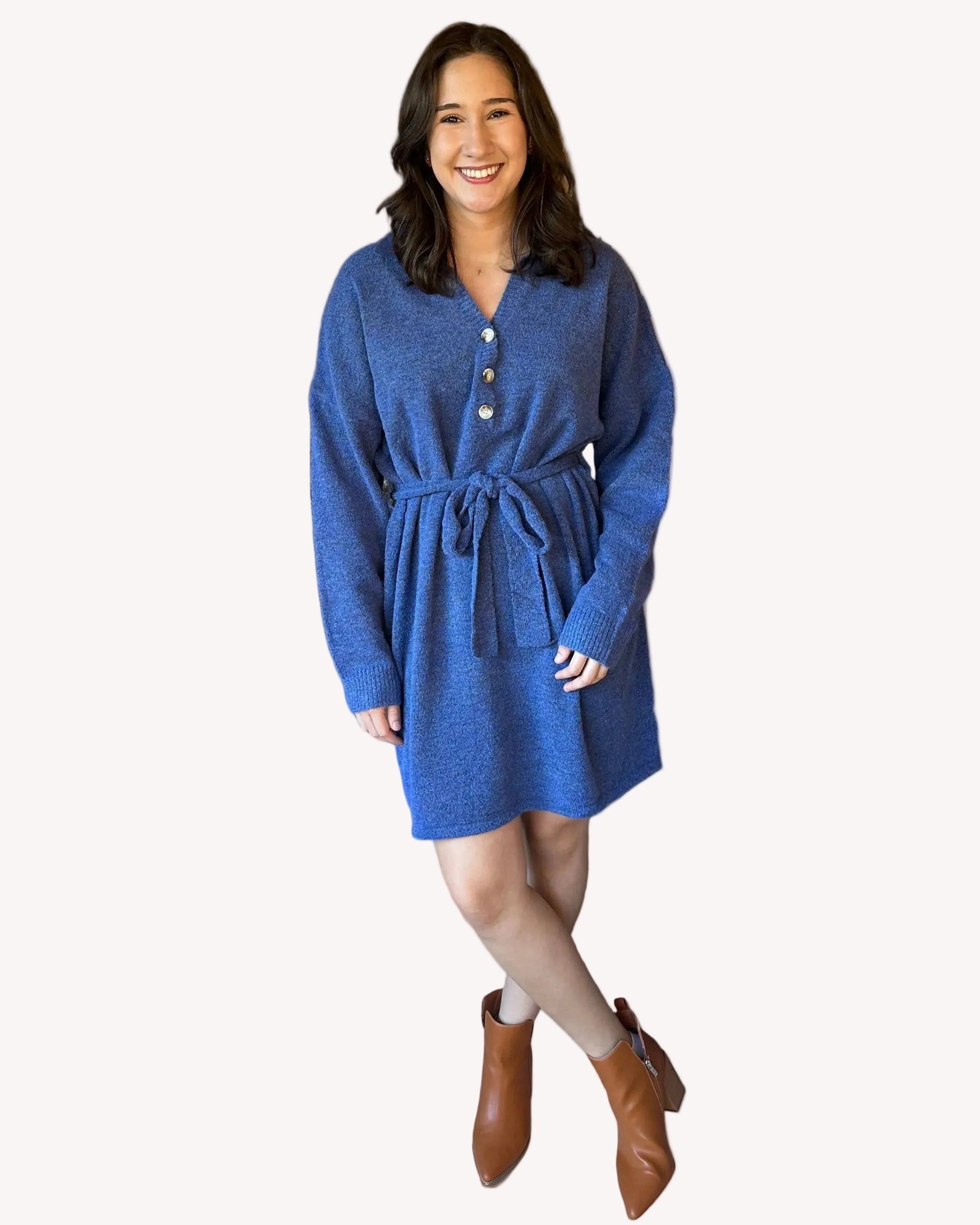 Belted knit tunic with collared V-neckline and relaxed longline fit