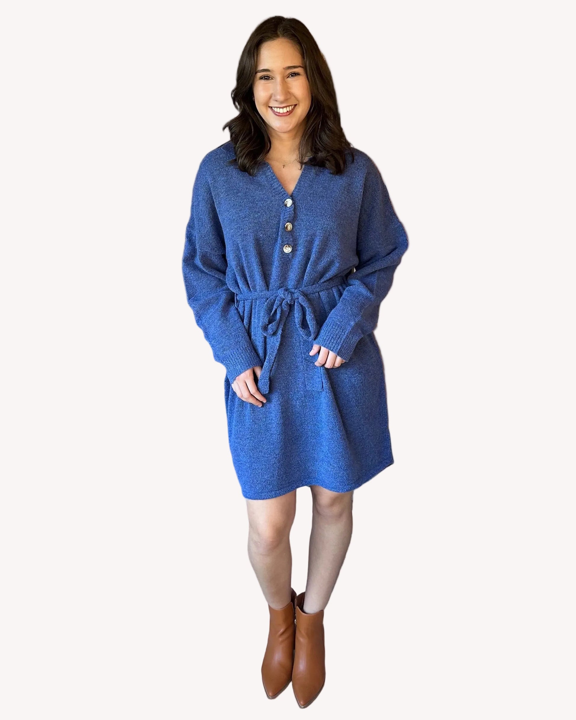 Belted knit tunic with collared V-neckline and relaxed longline fit