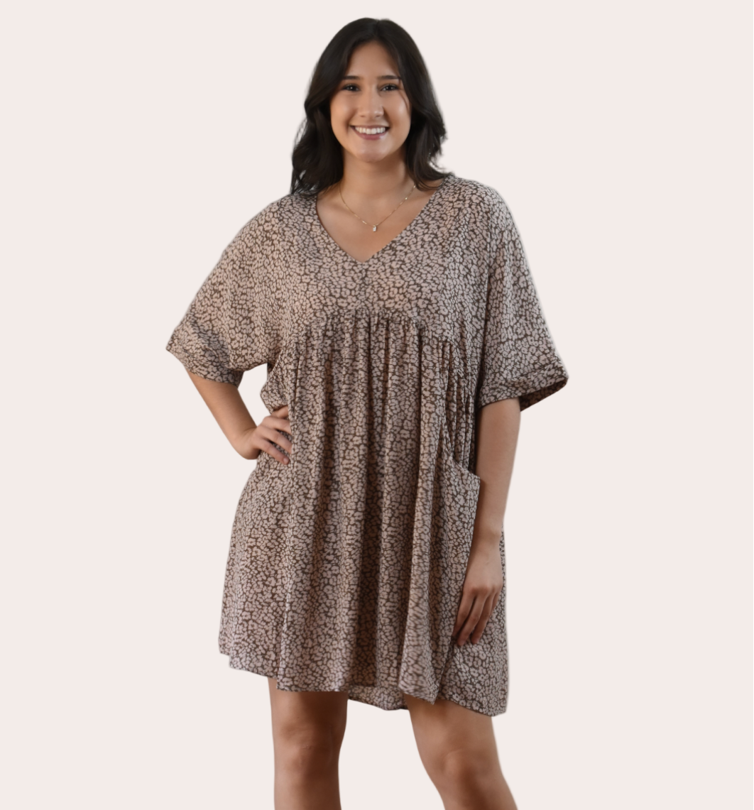 The Blush Leopard Babydoll Dress — soft blush and leopard print mini with v-neckline and dolman sleeves from Justyna Grace Boutique.