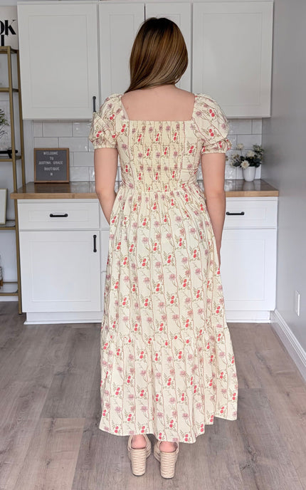 100 percent cotton maxi dress with puff sleeves and flowy silhouette